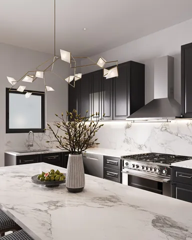 a kitchen with stainless steel appliances a sink and a stove