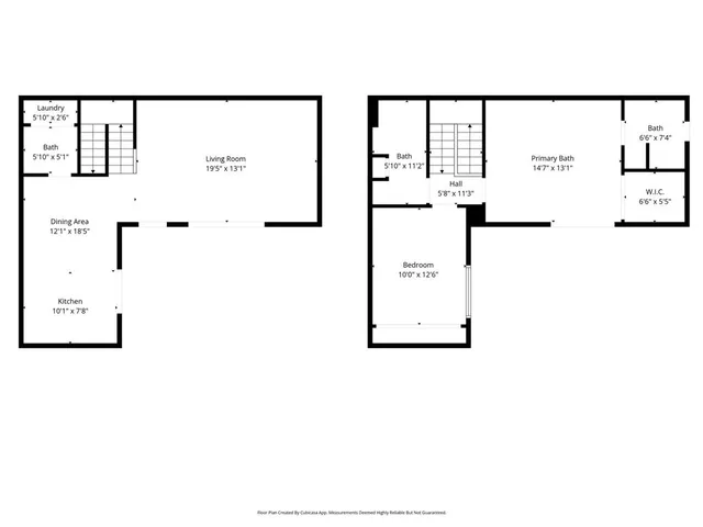 a picture of a open kitchen with a white wall and a refrigerator