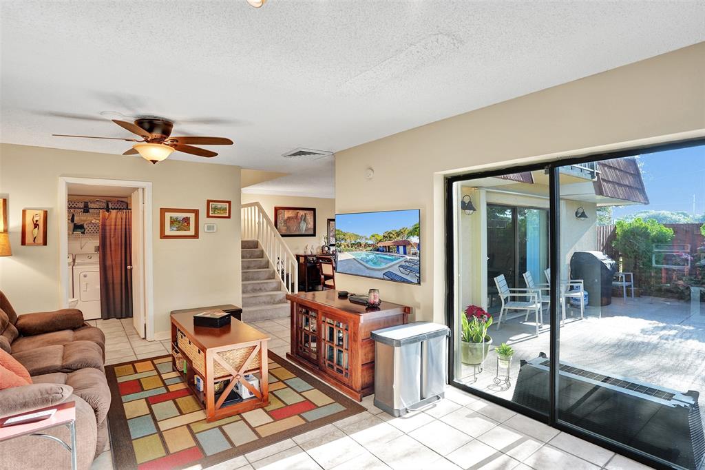 1525 Augusta Circle, Unit 109 Delray Beach, FL 33445 - Photo 9 of 23 a workspace with furniture