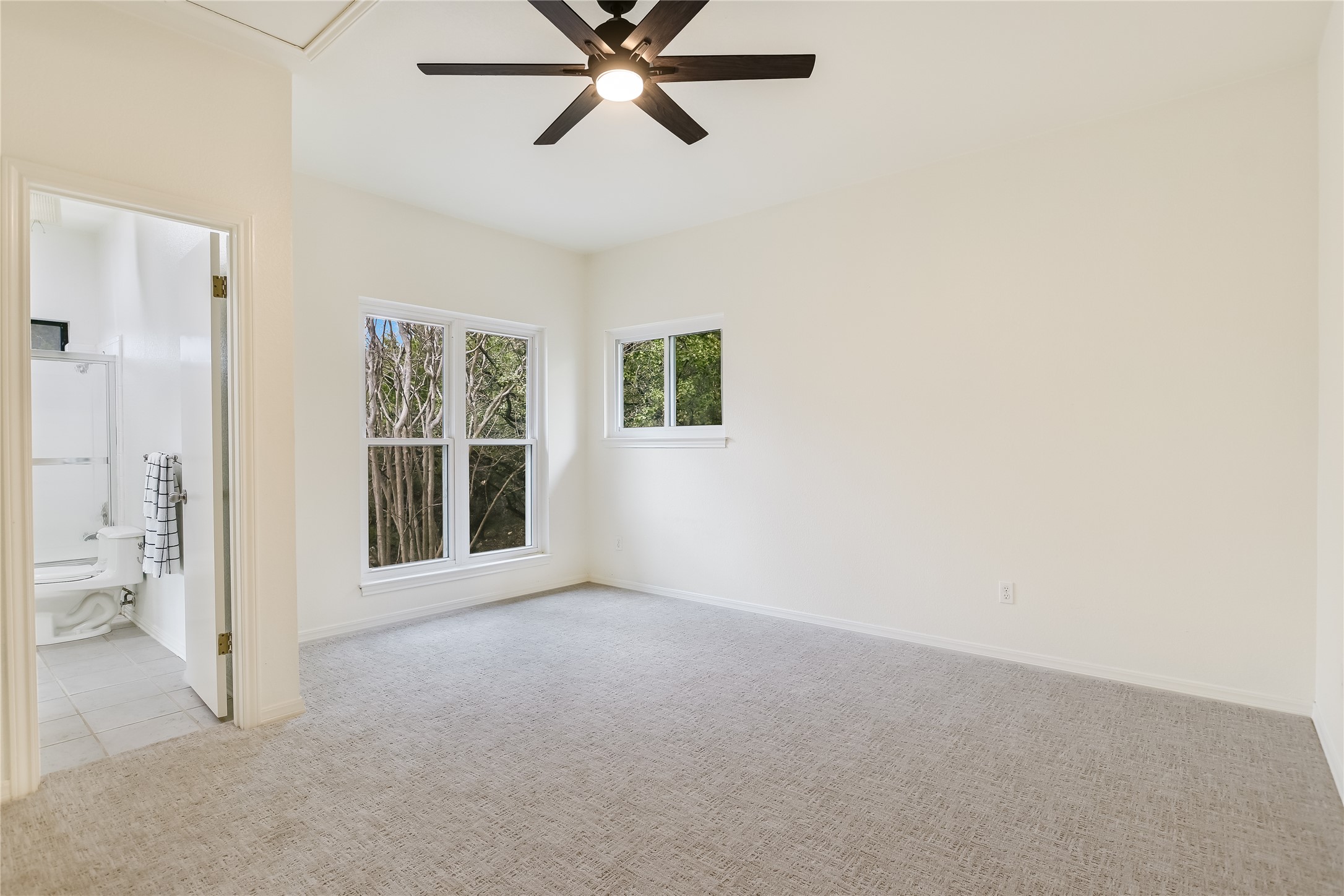 4906 Bob Cat Run Austin, TX 78731 - Photo 21 of 40 a view of an empty room with a window