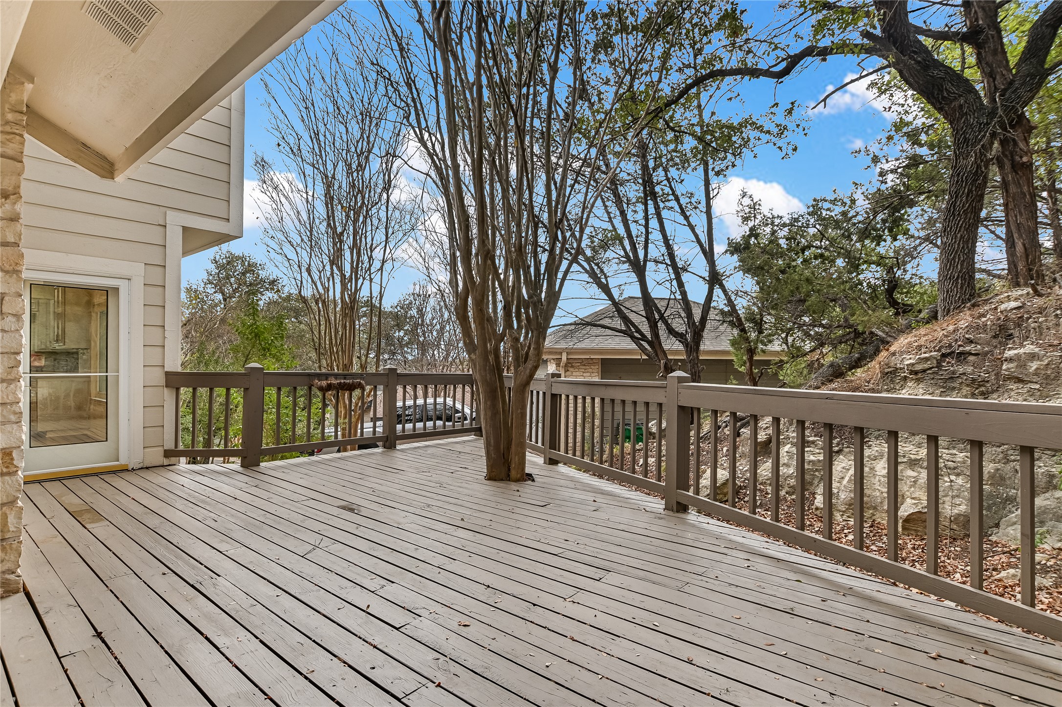4906 Bob Cat Run Austin, TX 78731 - Photo 26 of 40 a view of a wooden deck