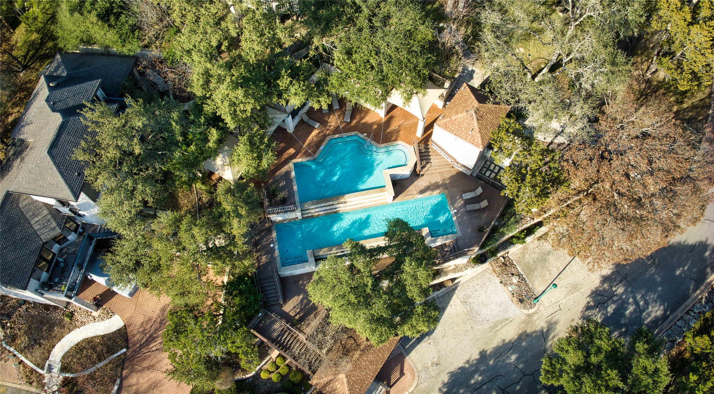 4906 Bob Cat Run Austin, TX 78731 - Photo 32 of 40 an aerial view of a house with a yard and garden