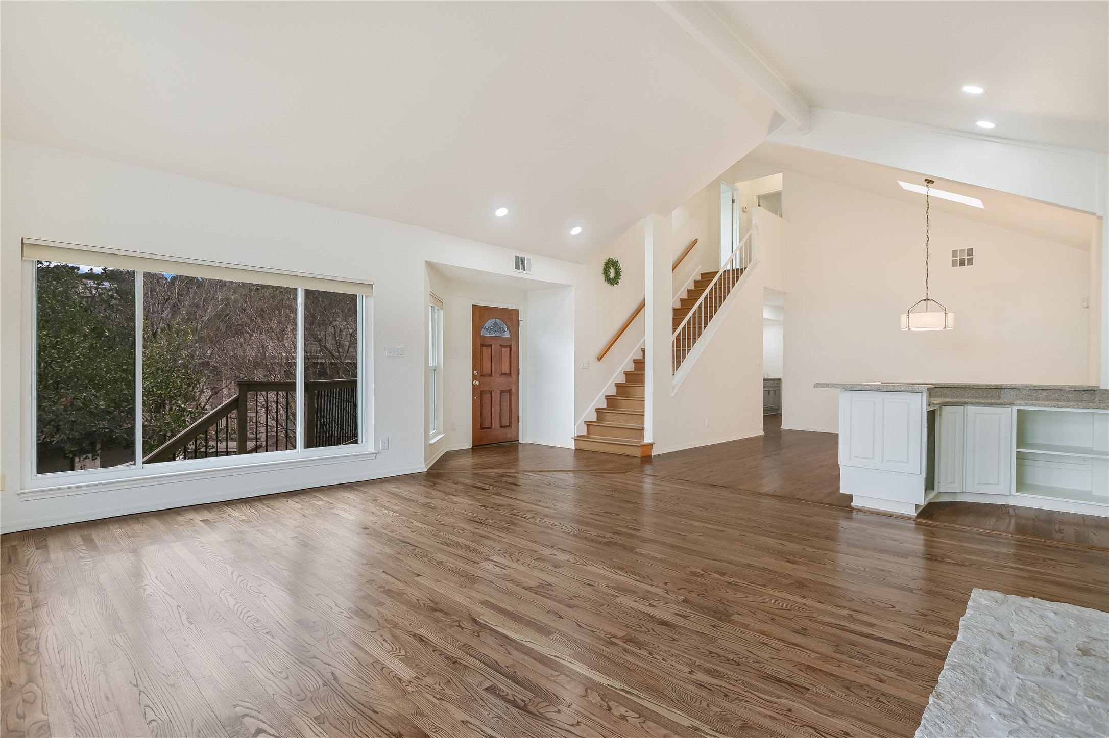 4906 Bob Cat Run Austin, TX 78731 - Photo 6 of 40 a view of an entryway with wooden floor