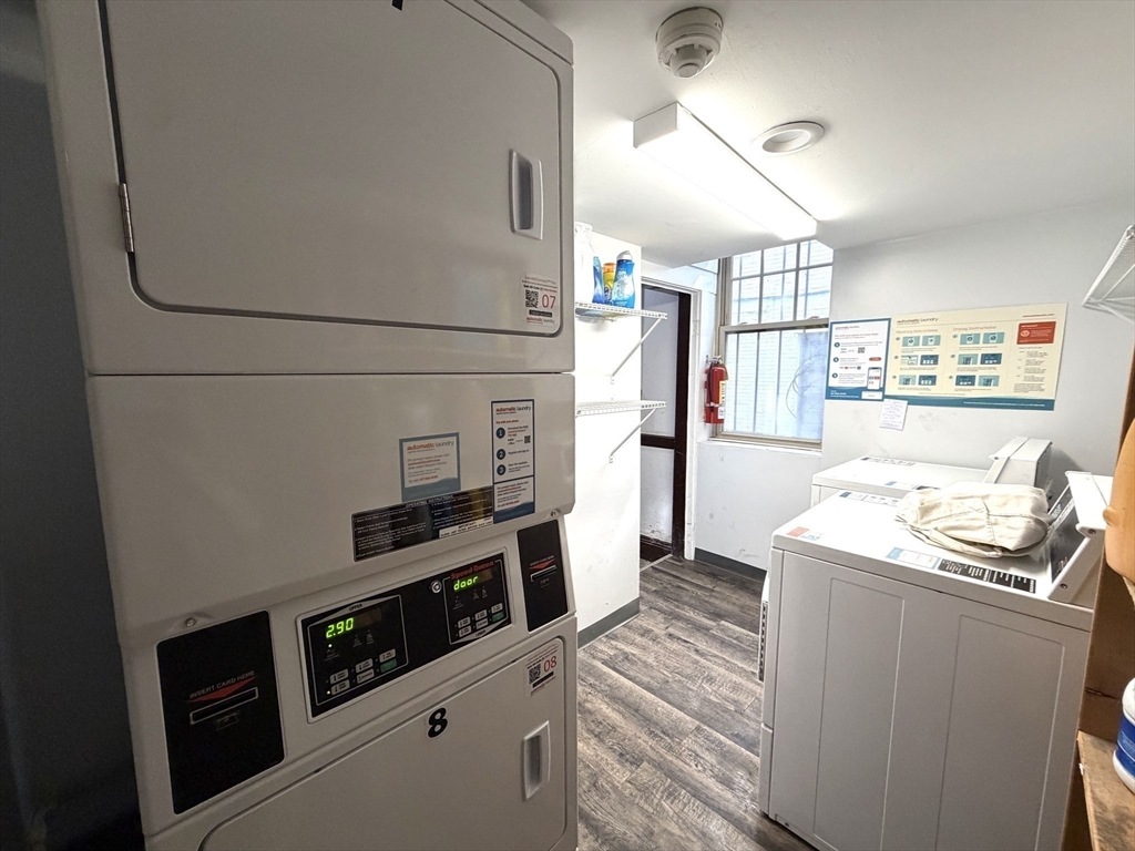 335 South Huntington Avenue, Unit 1 Boston, MA 02130 - Photo 11 of 11 a storage room with washer and dryer