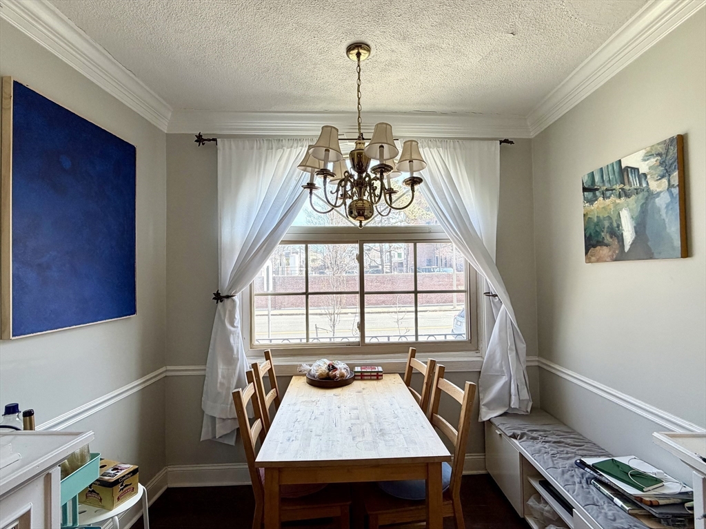 335 South Huntington Avenue, Unit 1 Boston, MA 02130 - Photo 6 of 11 a view of a dining room with furniture window and outside view