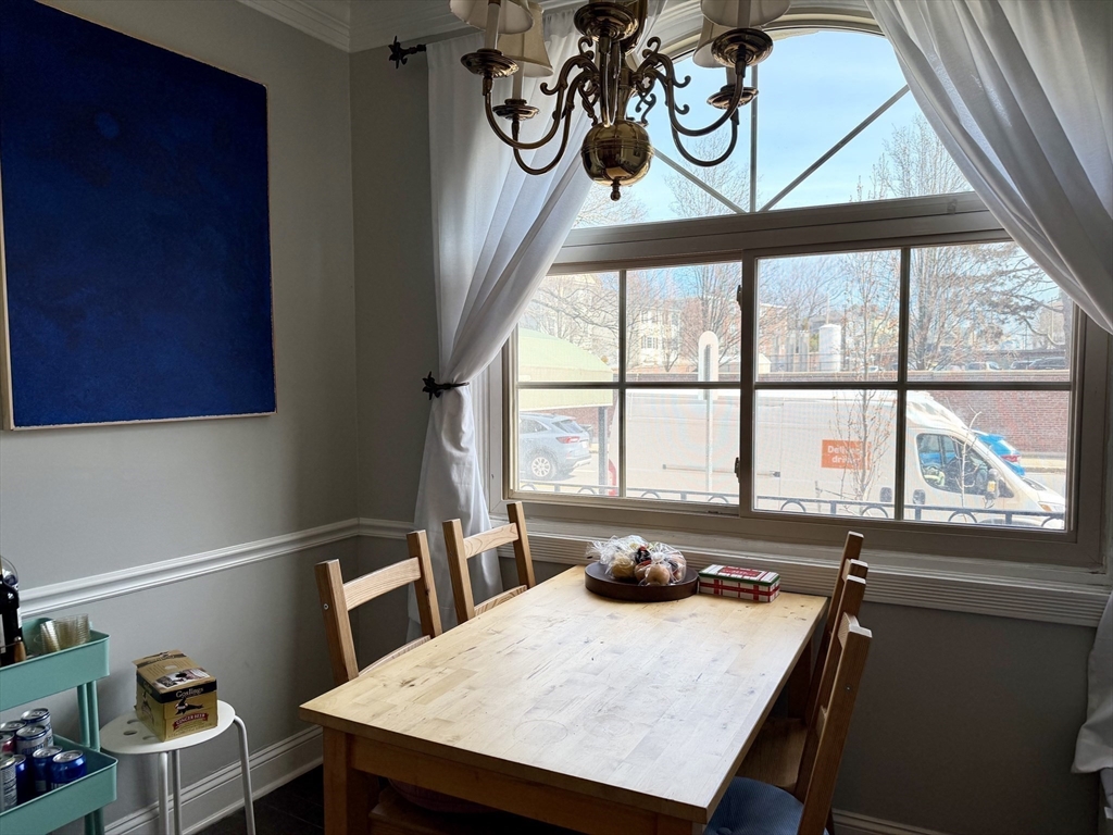 335 South Huntington Avenue, Unit 1 Boston, MA 02130 - Photo 7 of 11 a room with furniture and window