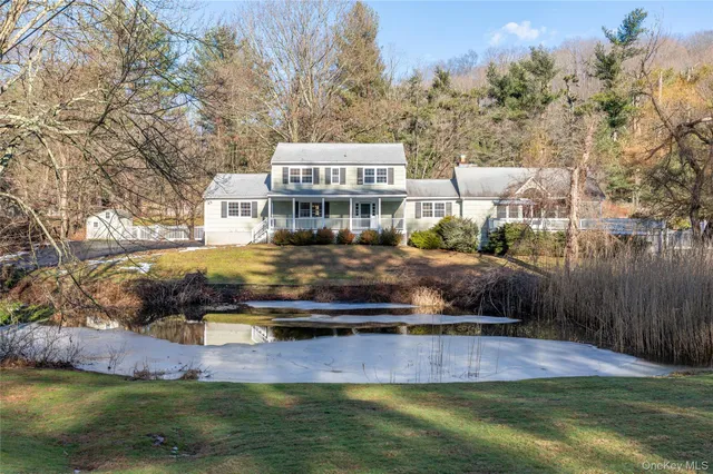 a swimming pool view with a lake view
