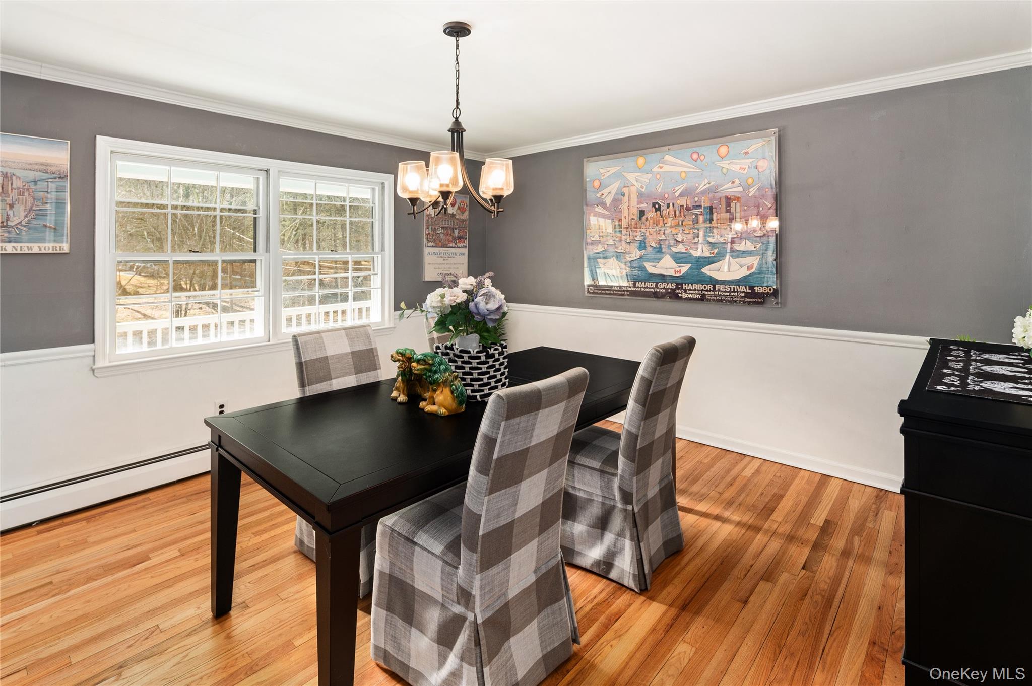 58 Millbrook Road Bedford, NY 10506 - Photo 11 of 41 a view of a dining room with furniture a chandelier and wooden floor
