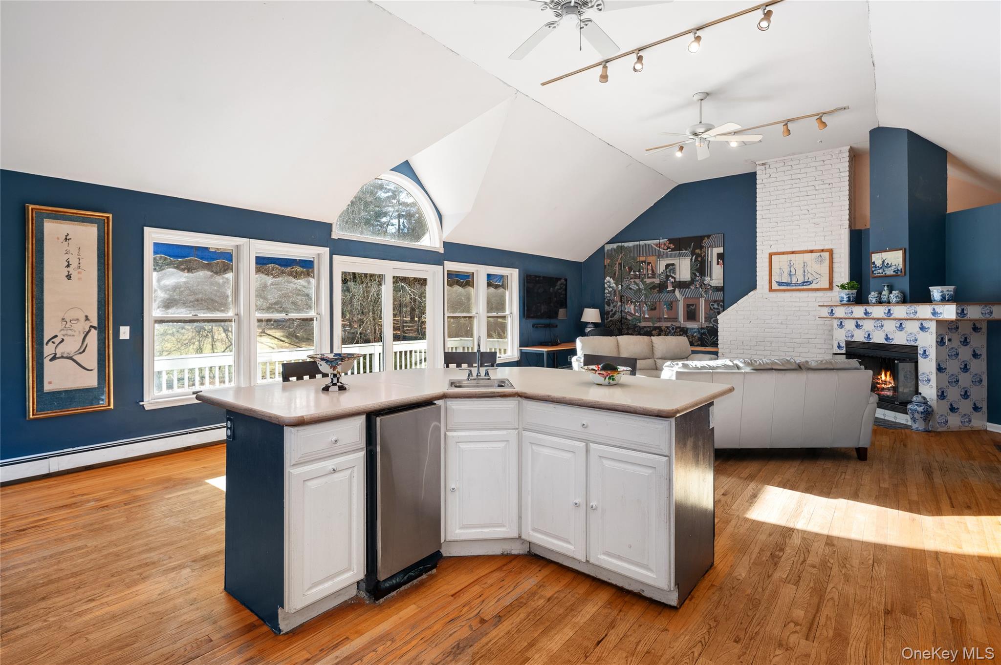 58 Millbrook Road Bedford, NY 10506 - Photo 41 of 41 a living room with stainless steel appliances granite countertop a sink and wooden floor