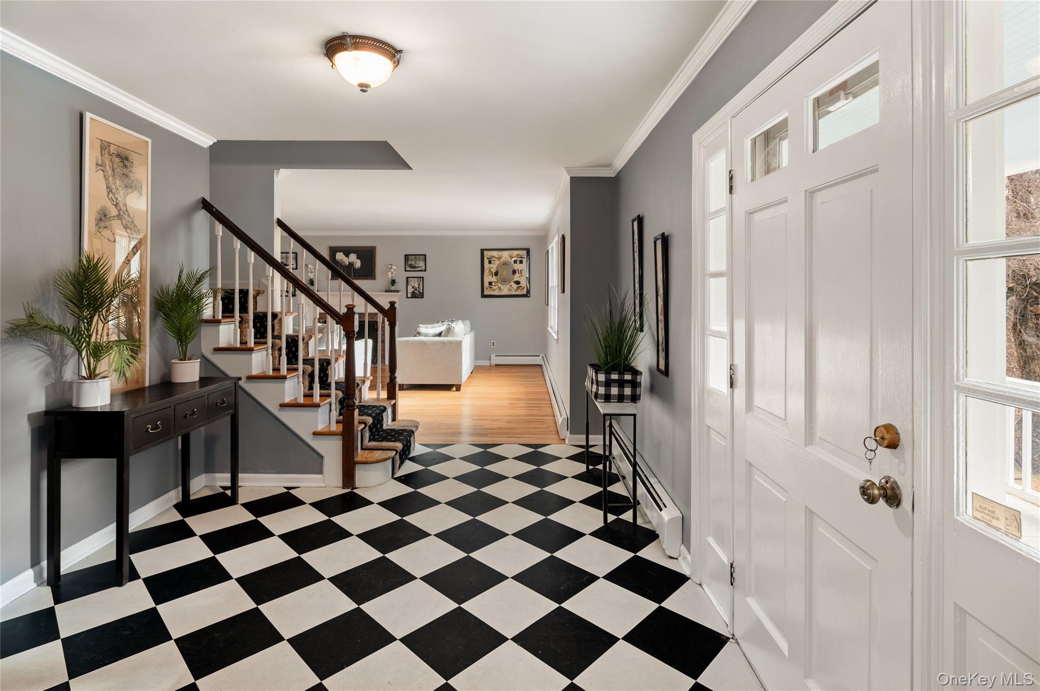 58 Millbrook Road Bedford, NY 10506 - Photo 3 of 41 a view of a hallway with a black and white checkered floor