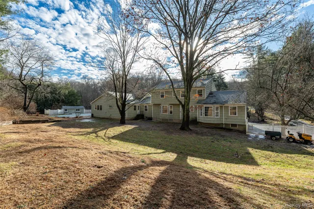 a view of a park with large trees