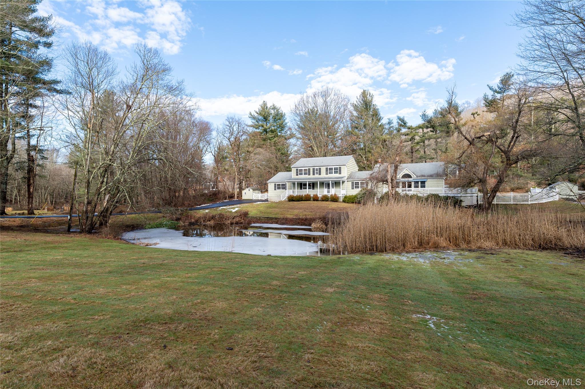 58 Millbrook Road Bedford, NY 10506 - Photo 31 of 41 a view of a house with a yard