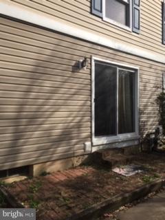 99 Ridgelawn Road, Unit A Reisterstown, MD 21136 - Photo 3 of 10 New sliders to brick side porch