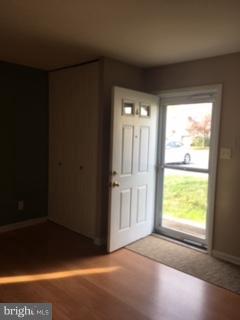 99 Ridgelawn Road, Unit A Reisterstown, MD 21136 - Photo 4 of 10 Enter onto lovely wood look laminate flooring
