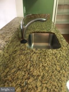 99 Ridgelawn Road, Unit A Reisterstown, MD 21136 - Photo 9 of 10 Granite & undermounted sink with new faucet