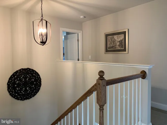 a view of a hallway with entryway