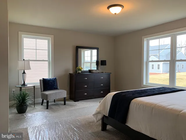 a view of a hallway with windows