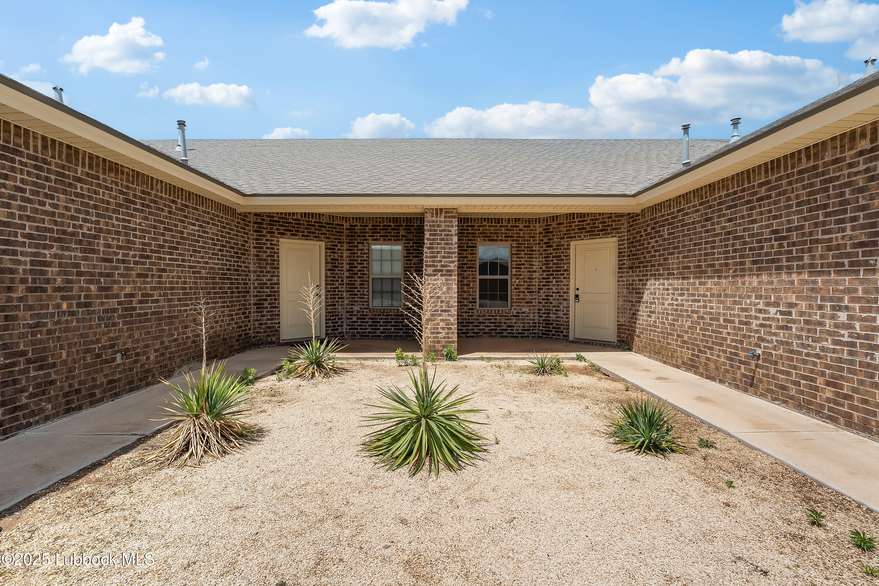 5528 Lehigh Street Lubbock, TX 79416 - Photo 3 of 23 a backyard of a house with seating space