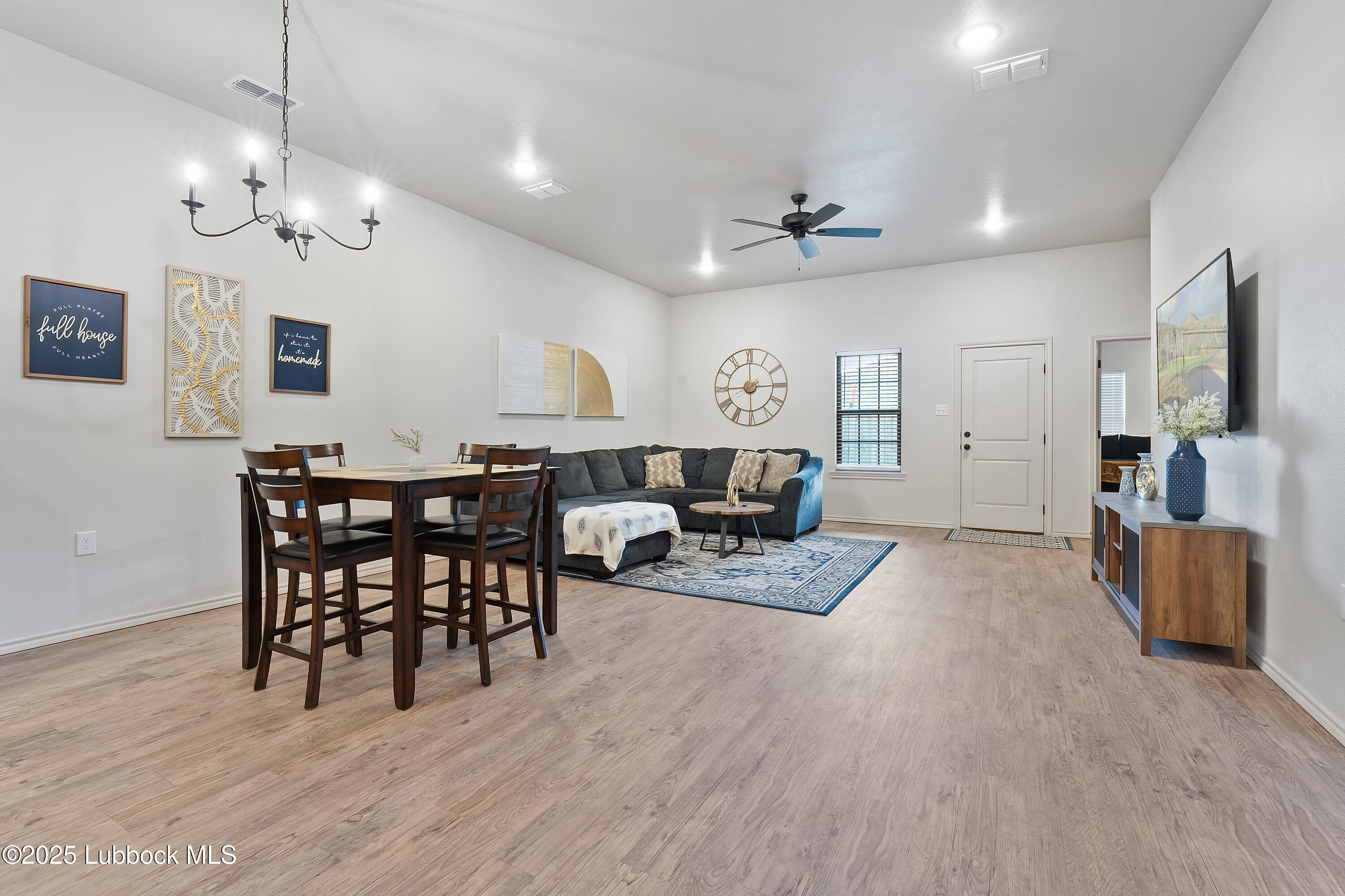 5528 Lehigh Street Lubbock, TX 79416 - Photo 5 of 23 a view of a livingroom and dining room