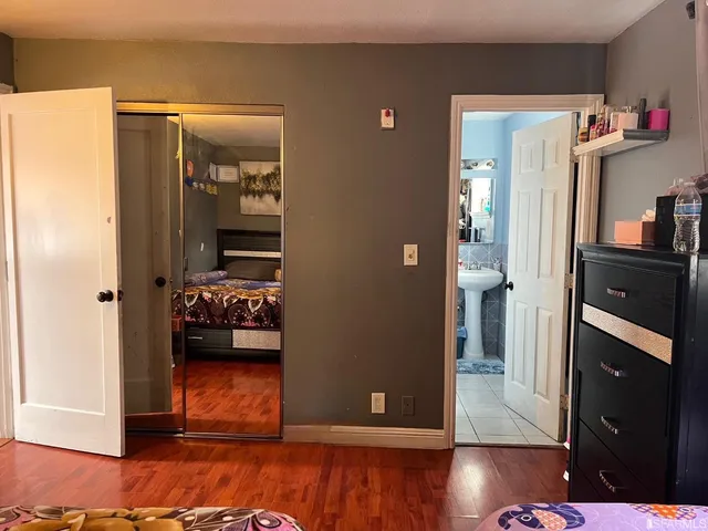 a car parked in parking lot of a house