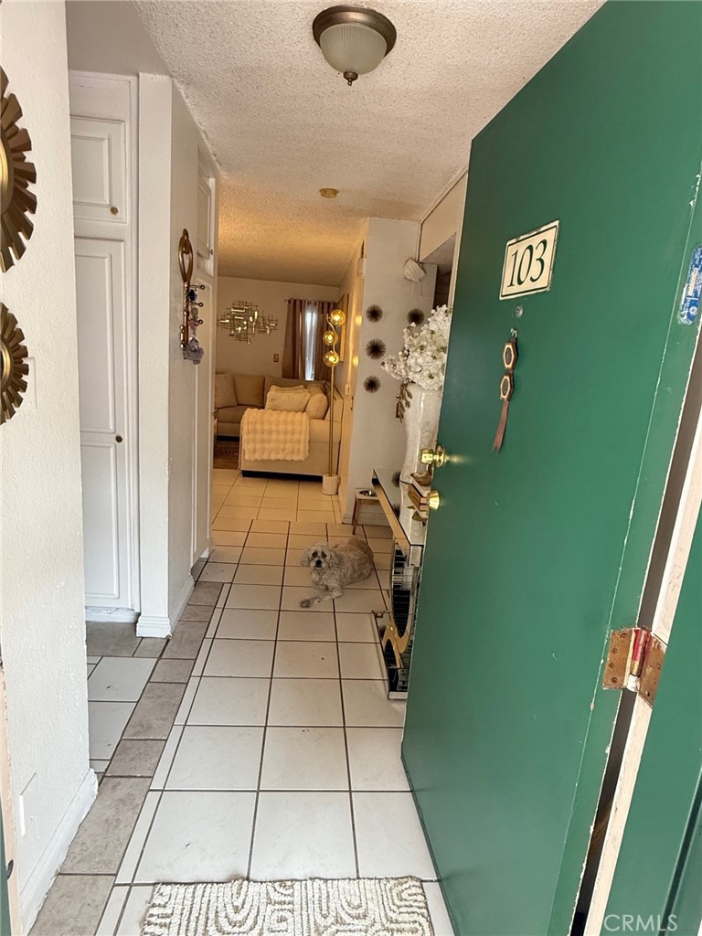 450 East 4th Street, Unit 103 Santa Ana, CA 92701 - Photo 10 of 10 a view of en suite bathroom with a tub and shower