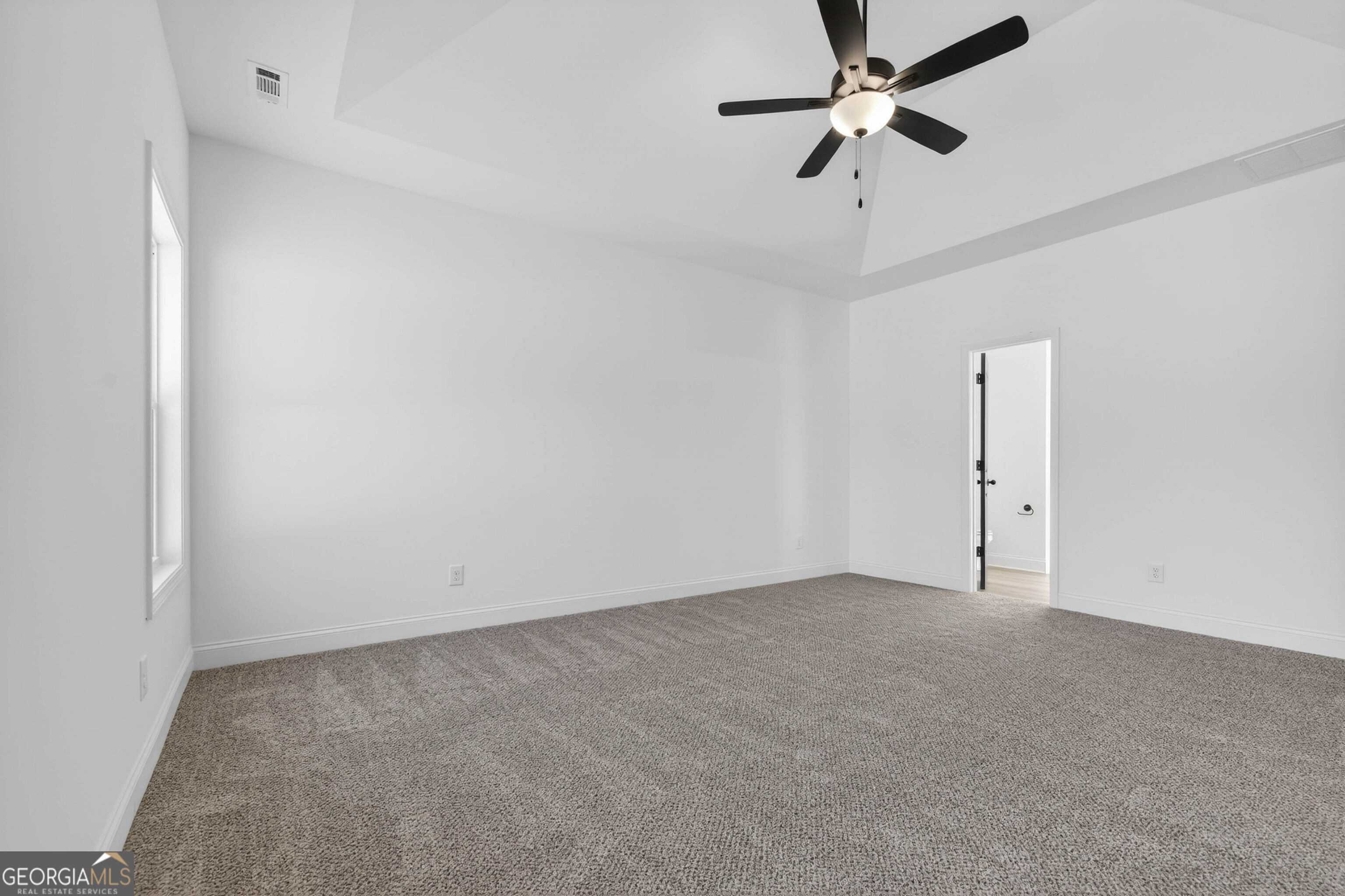 707 Oakmont Trail Villa Rica, GA 30180 - Photo 14 of 33 an empty room with fan