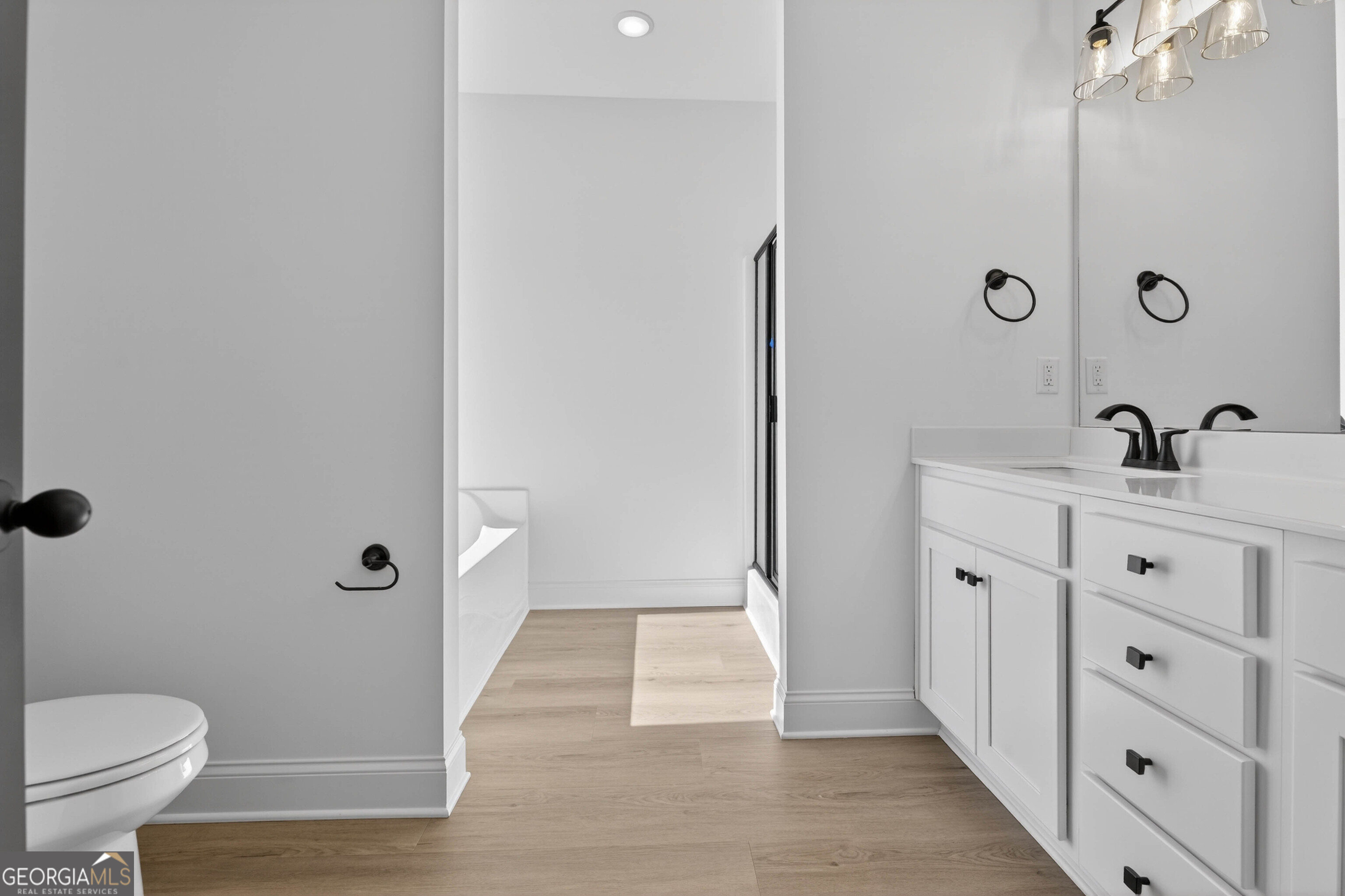 707 Oakmont Trail Villa Rica, GA 30180 - Photo 17 of 33 a bathroom with a sink a toilet a tub and shower