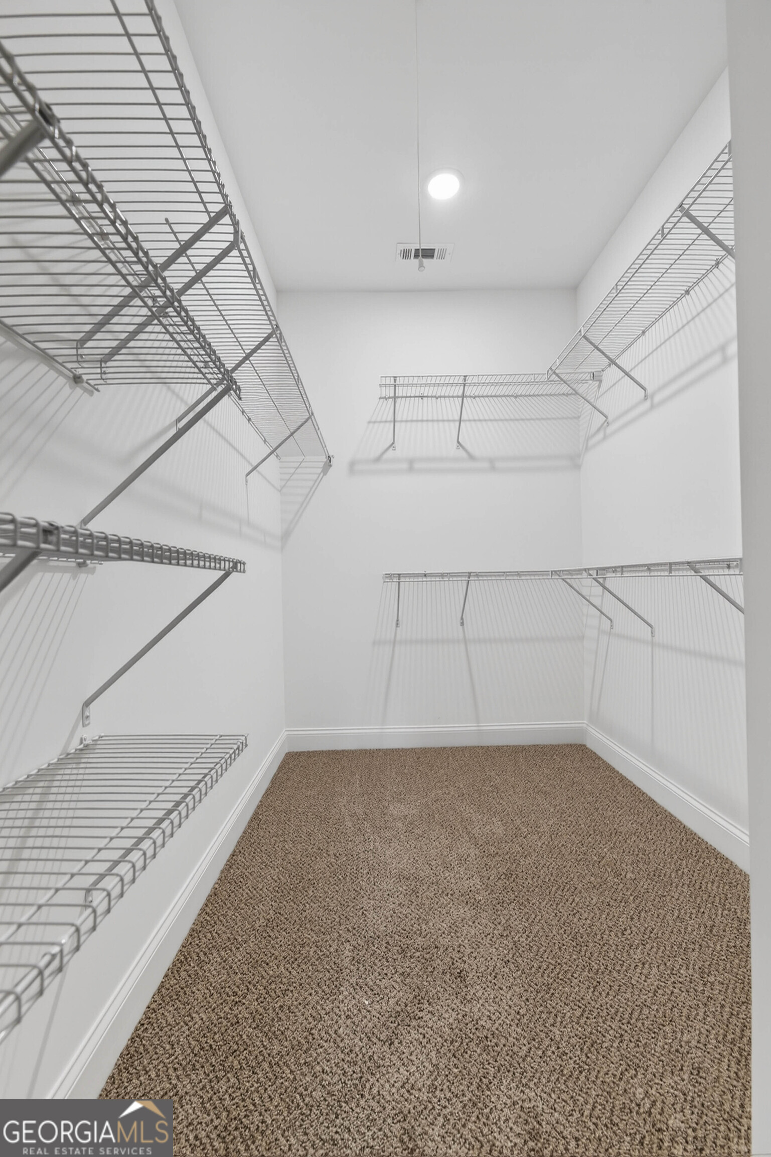 707 Oakmont Trail Villa Rica, GA 30180 - Photo 20 of 33 a view of a room with racks on the wall