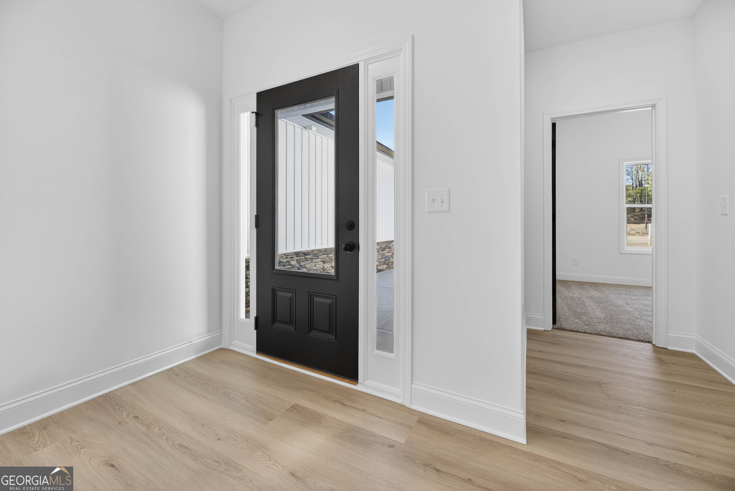 707 Oakmont Trail Villa Rica, GA 30180 - Photo 2 of 33 wooden floor and closet in a room