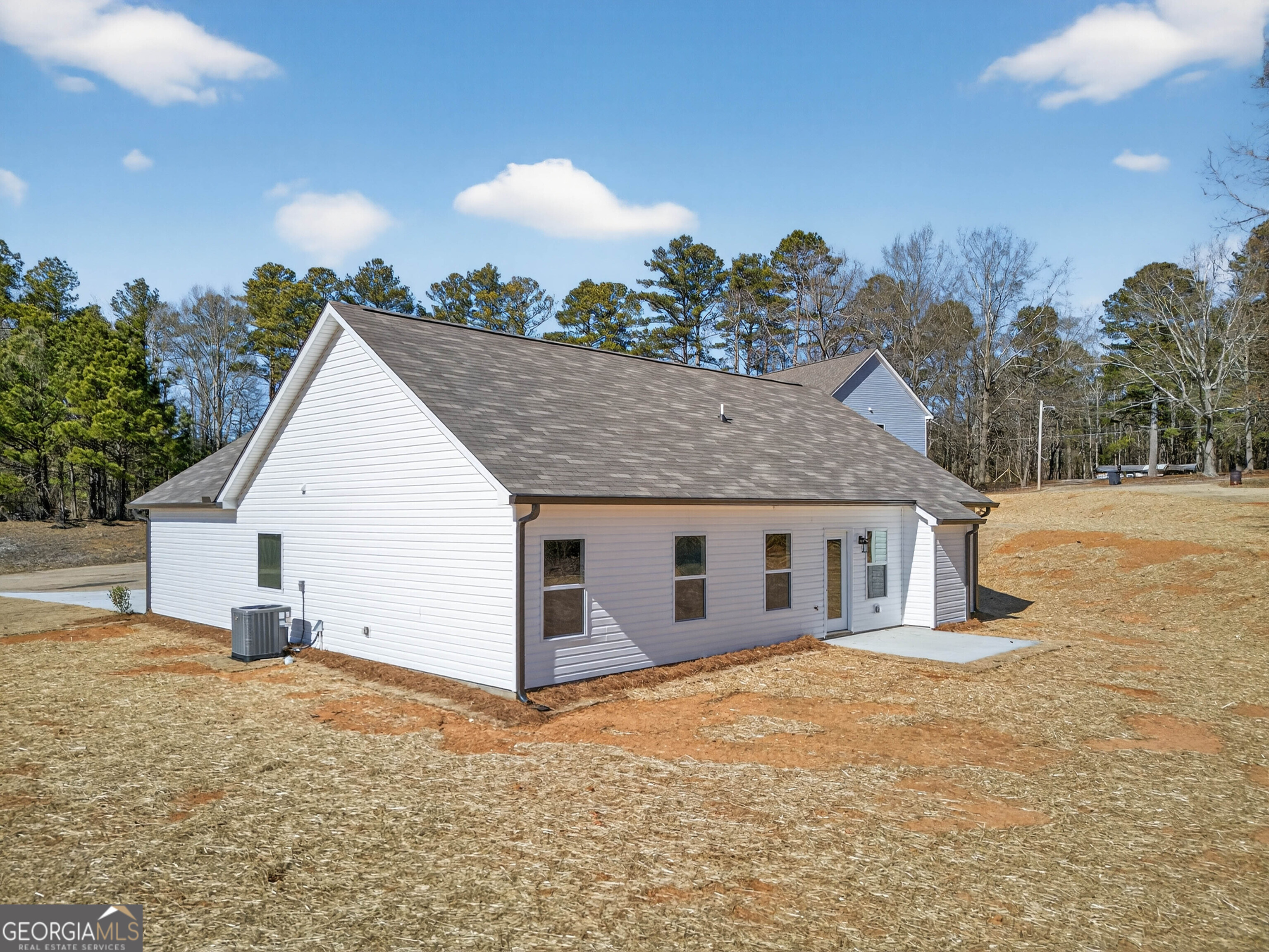 707 Oakmont Trail Villa Rica, GA 30180 - Photo 30 of 33 a view of a house with a dry yard and covered with snow