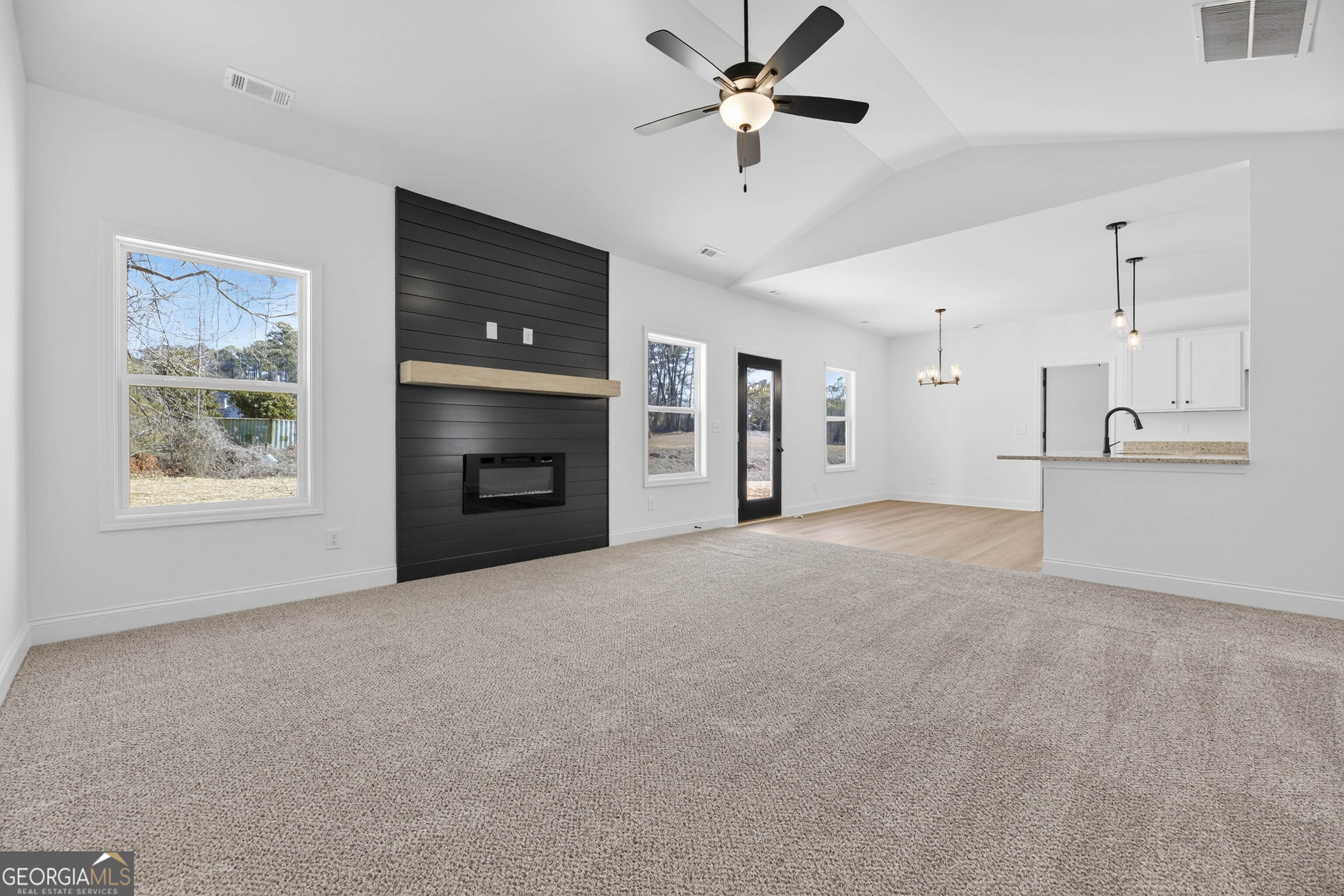 707 Oakmont Trail Villa Rica, GA 30180 - Photo 4 of 33 a view of an empty room with a window