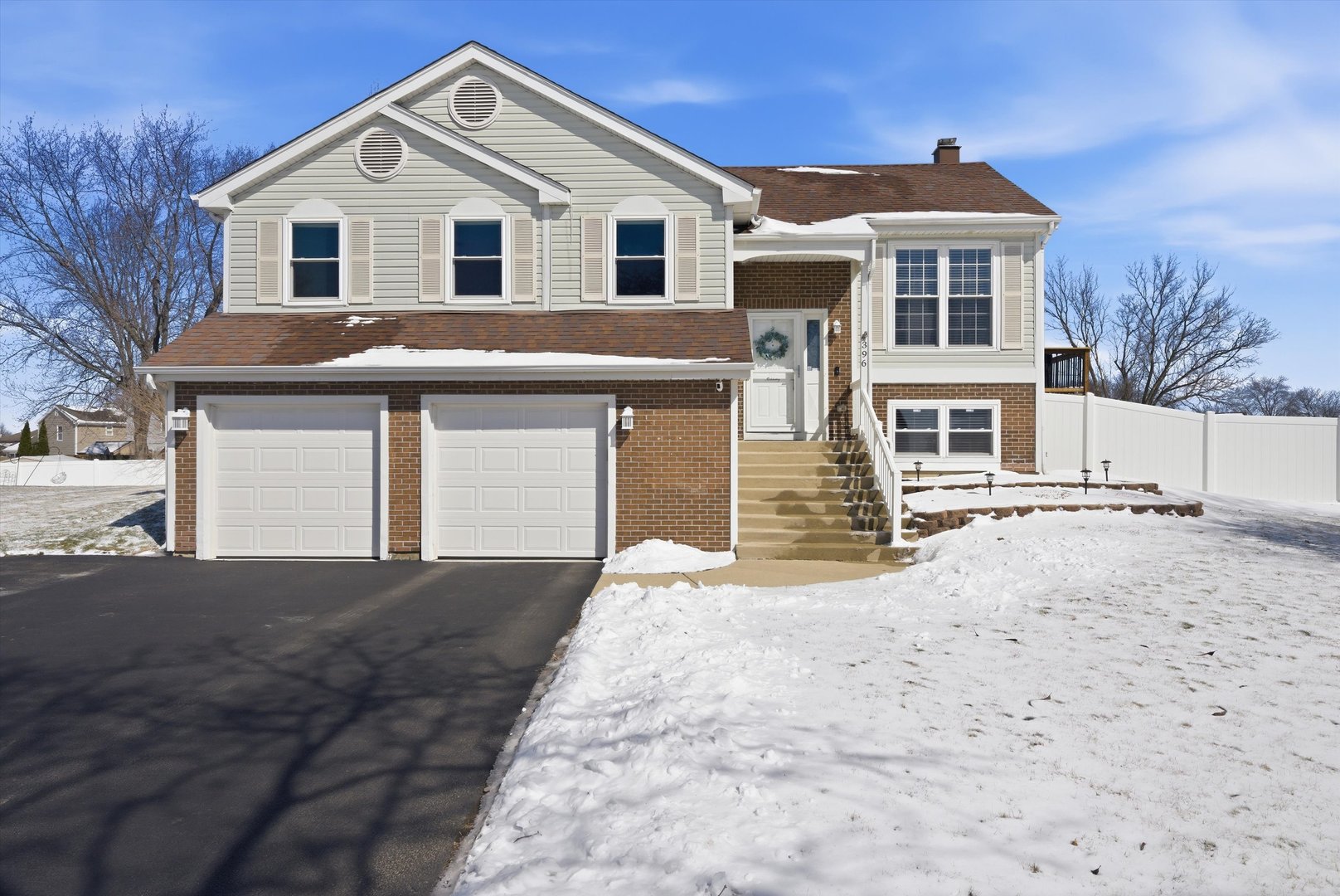 396 Nantucket Court Bartlett, IL 60103 - Photo 1 of 36 a front view of a house with a yard