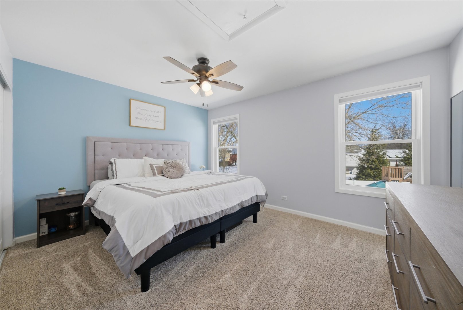 396 Nantucket Court Bartlett, IL 60103 - Photo 17 of 36 a spacious bedroom with a bed and a window