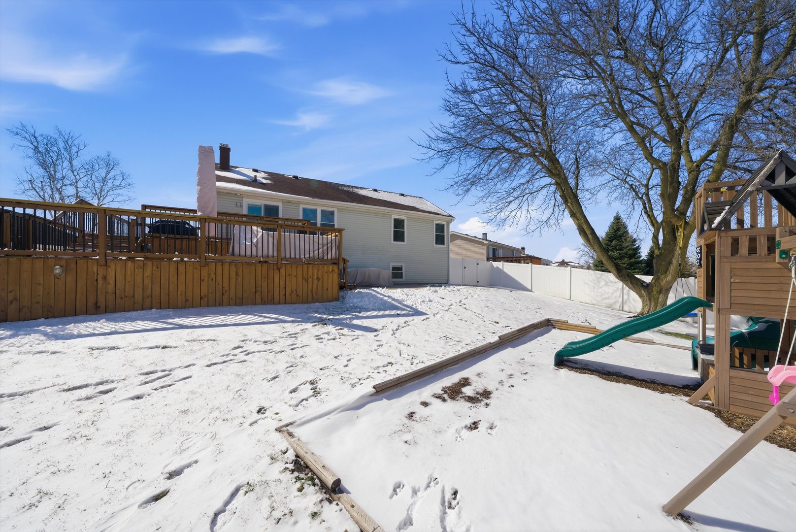 396 Nantucket Court Bartlett, IL 60103 - Photo 29 of 36 a view of a house with snow on the road