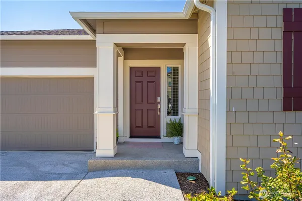 a view of a entryway door front of house