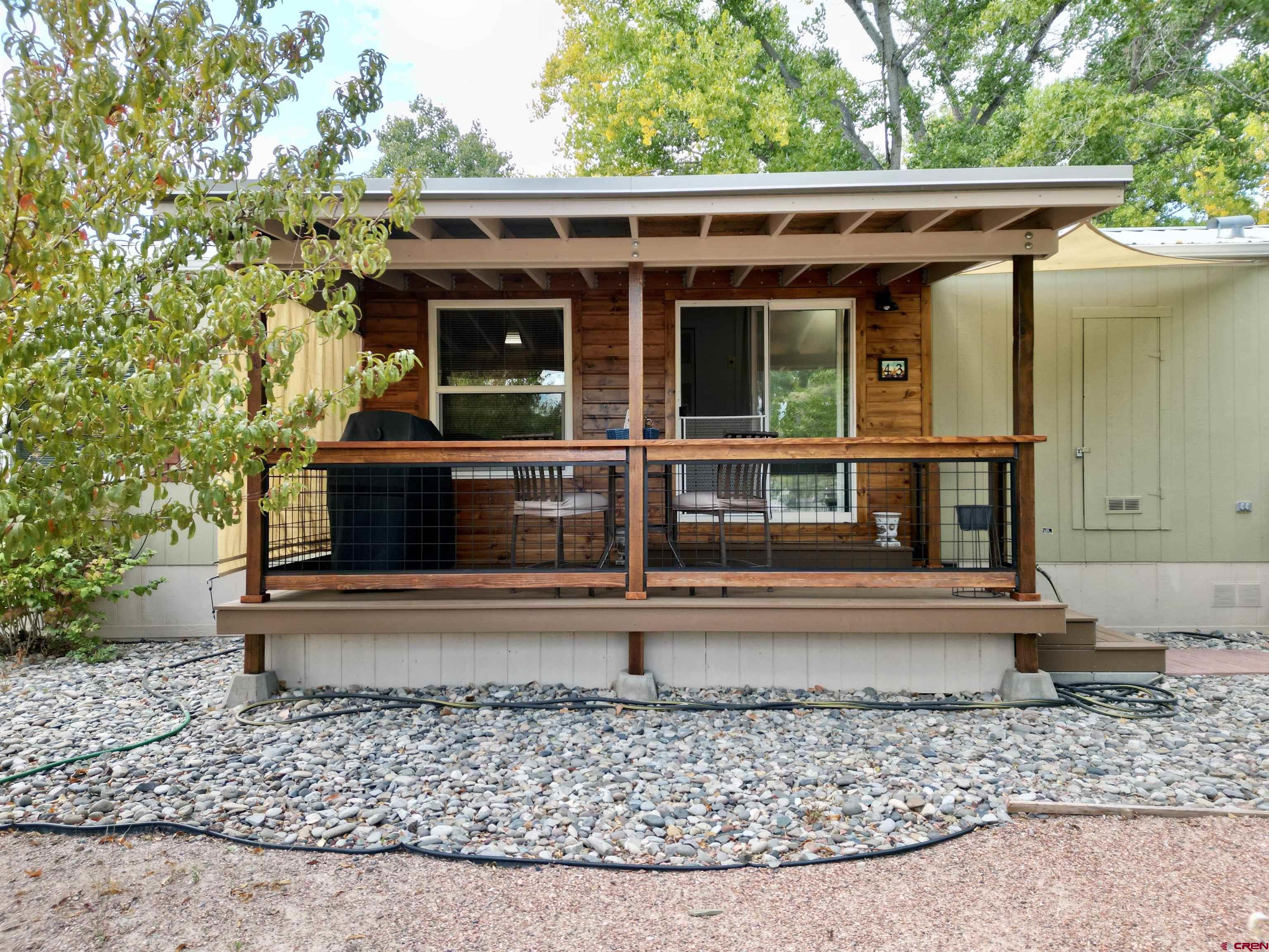 676 Highway 50, Unit SPACE #43 Delta, CO 81416 - Photo 26 of 33 a view of house with a yard