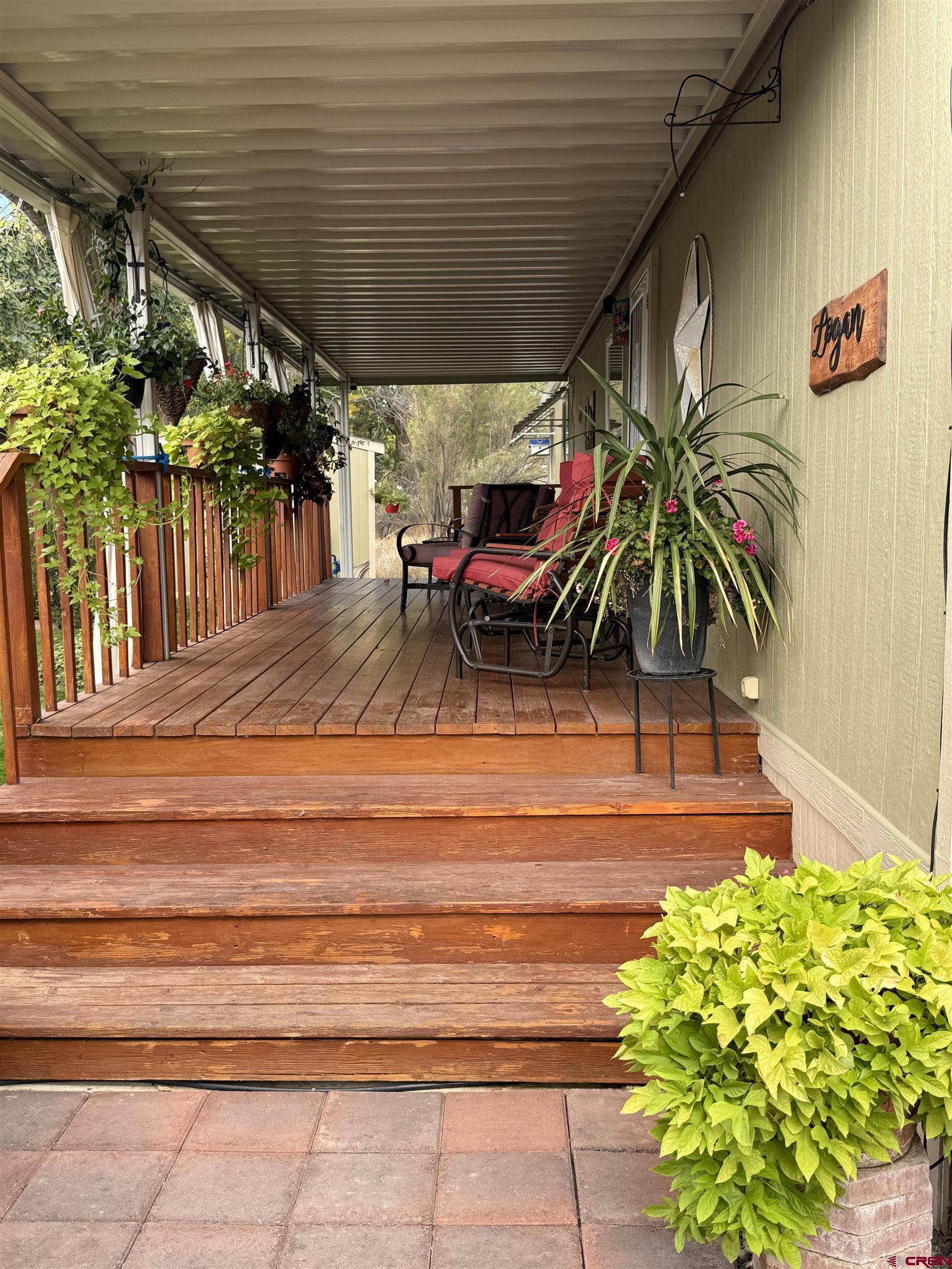 676 Highway 50, Unit SPACE #43 Delta, CO 81416 - Photo 7 of 33 a view of a porch with furniture