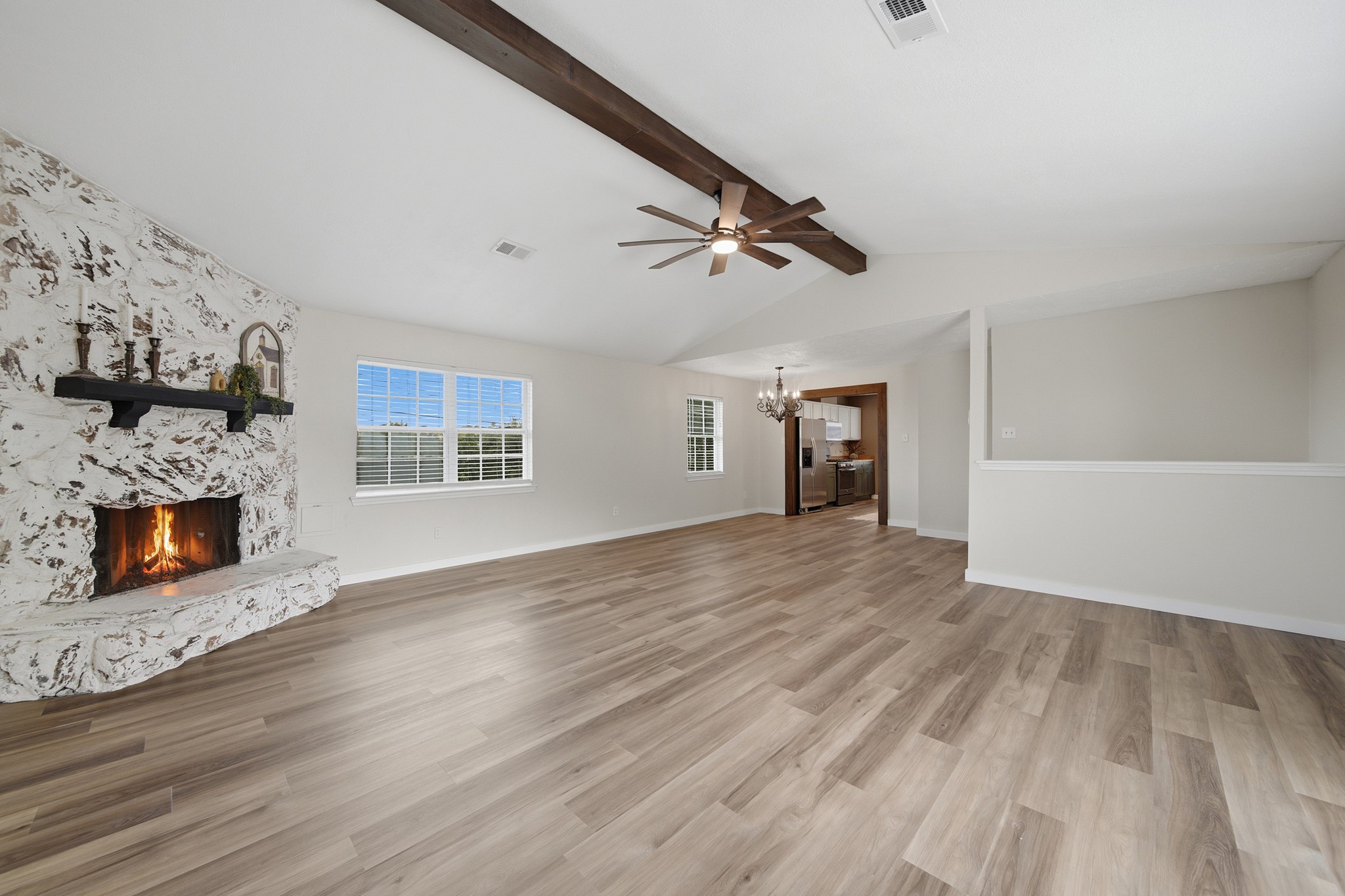 3403 Dryburgh Court Huffman, TX 77336 - Photo 7 of 29 Large Family Room with a beautiful stone fireplace