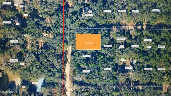 an aerial view of multiple house with yard