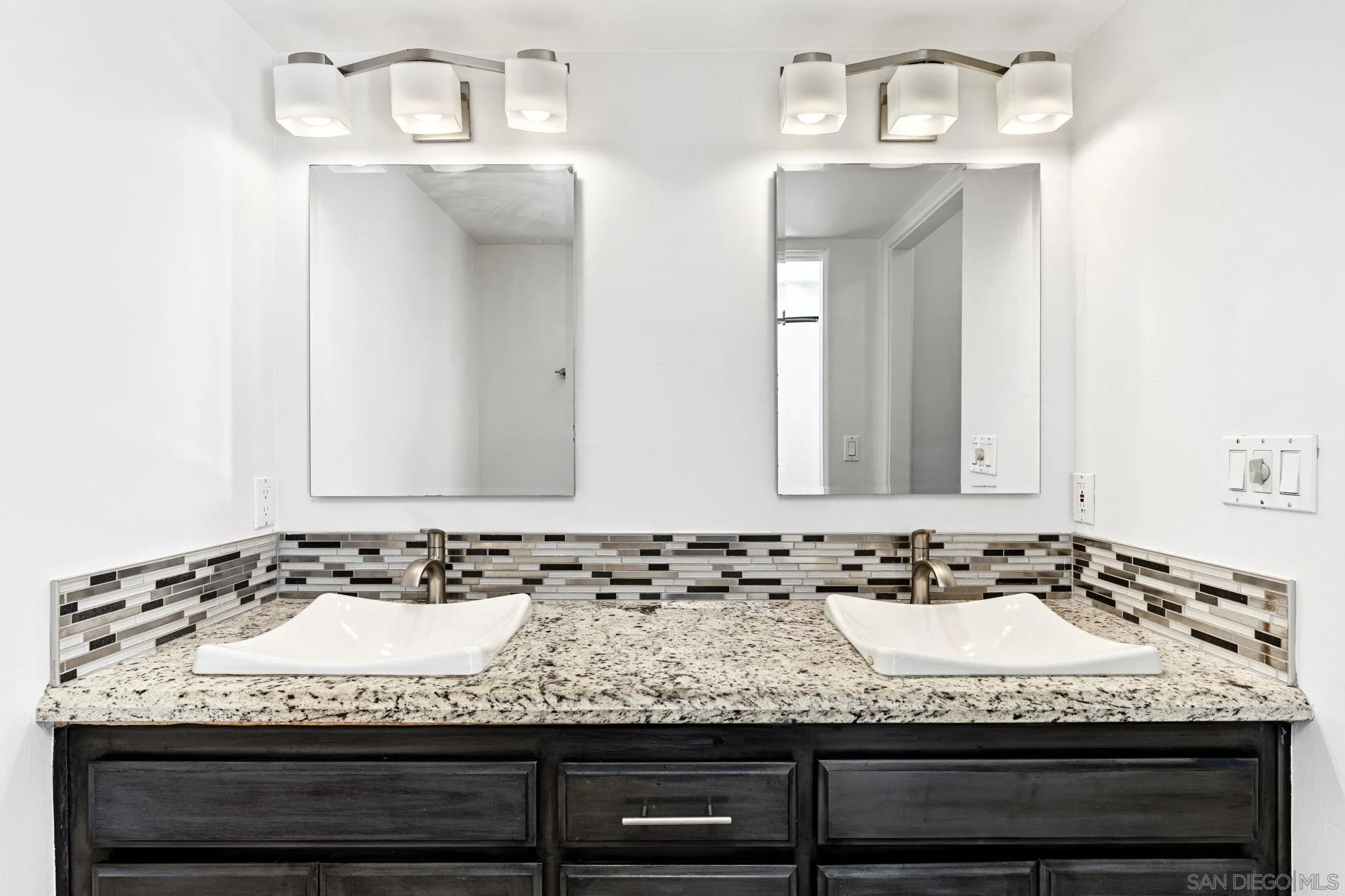 200 Pine Street, Unit 1 Oceanside, CA 92054 - Photo 15 of 28 a view of a sink and mirror