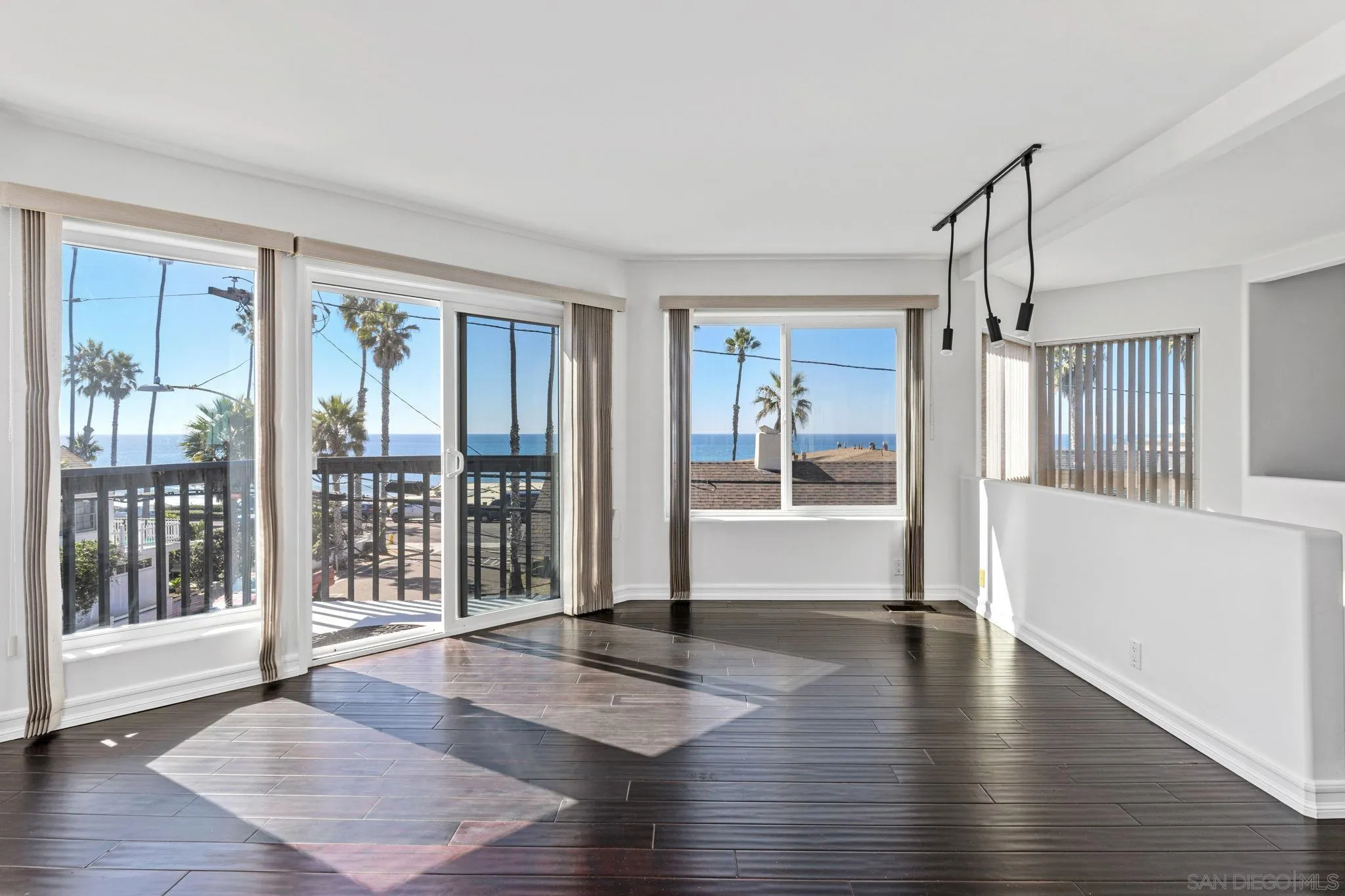 200 Pine Street, Unit 1 Oceanside, CA 92054 - Photo 6 of 28 a view of an entryway with wooden floor and a window