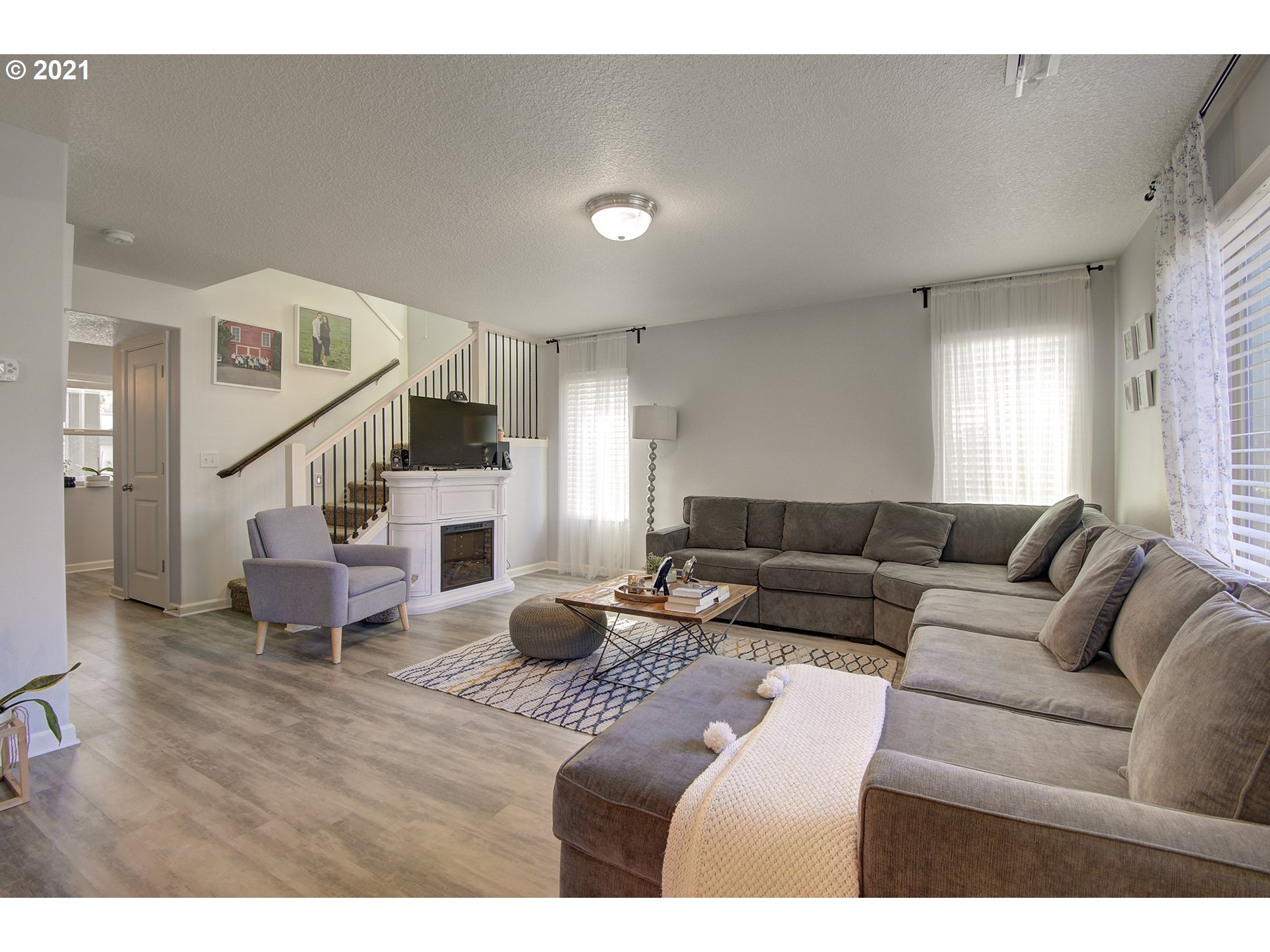 2312 South Sauk Way Ridgefield, WA 98642 - Photo 11 of 29 a living room with furniture and wooden floor