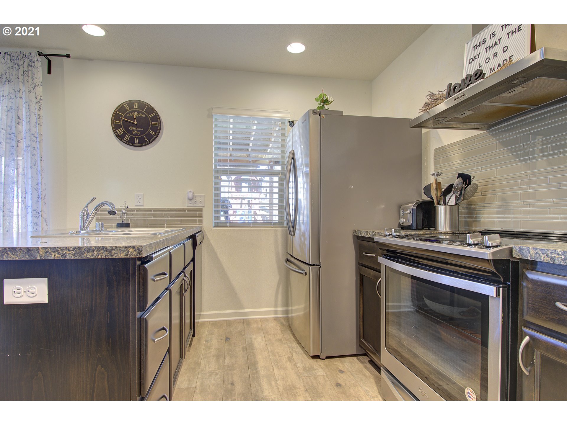 2312 South Sauk Way Ridgefield, WA 98642 - Photo 13 of 29 a kitchen with a sink cabinets and appliances
