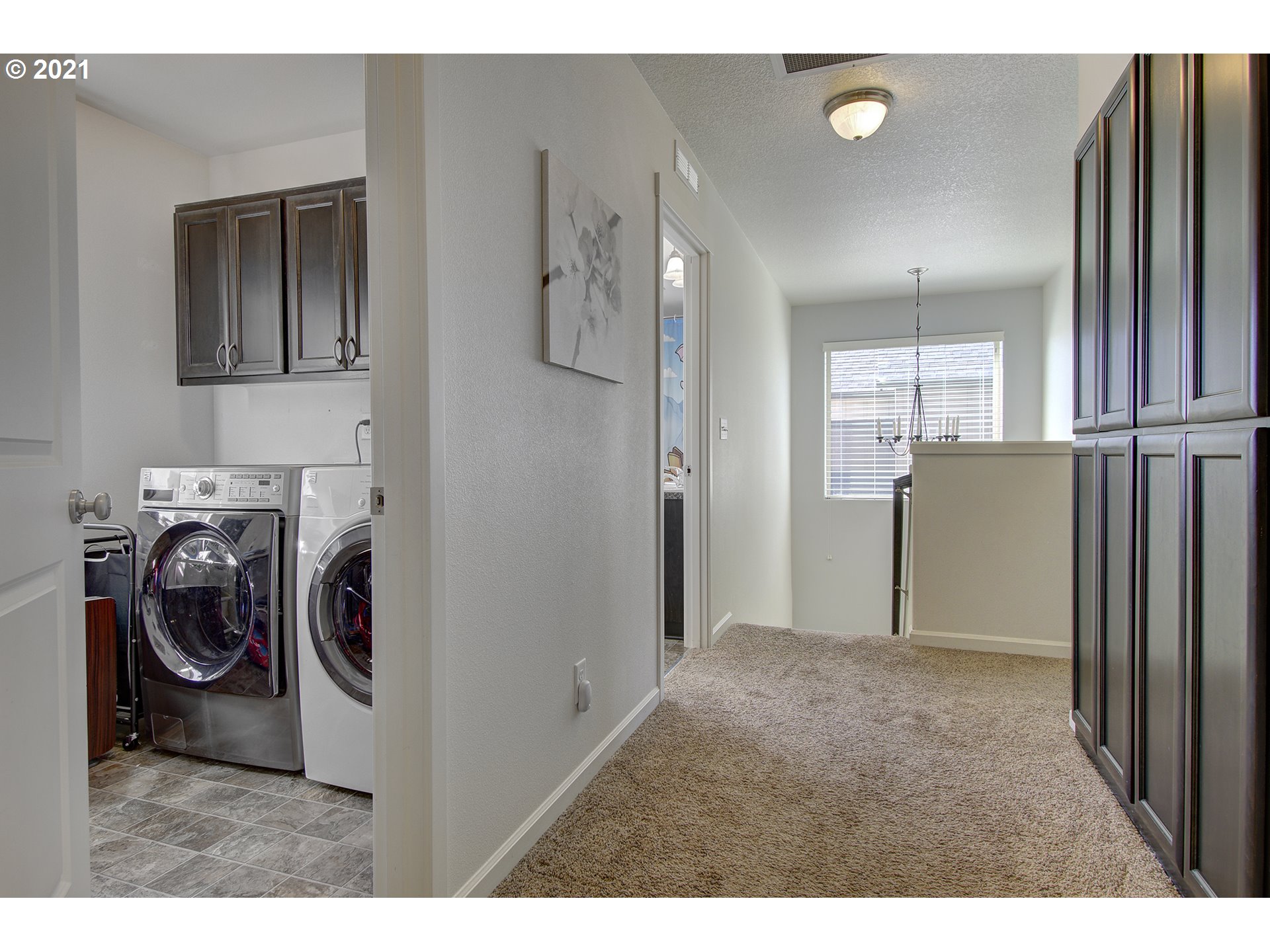2312 South Sauk Way Ridgefield, WA 98642 - Photo 20 of 29 a view of a kitchen with washer and dryer