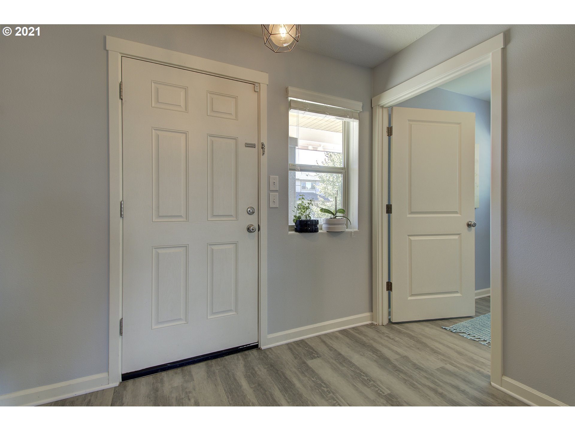 2312 South Sauk Way Ridgefield, WA 98642 - Photo 5 of 29 an empty room with wooden floor and closet