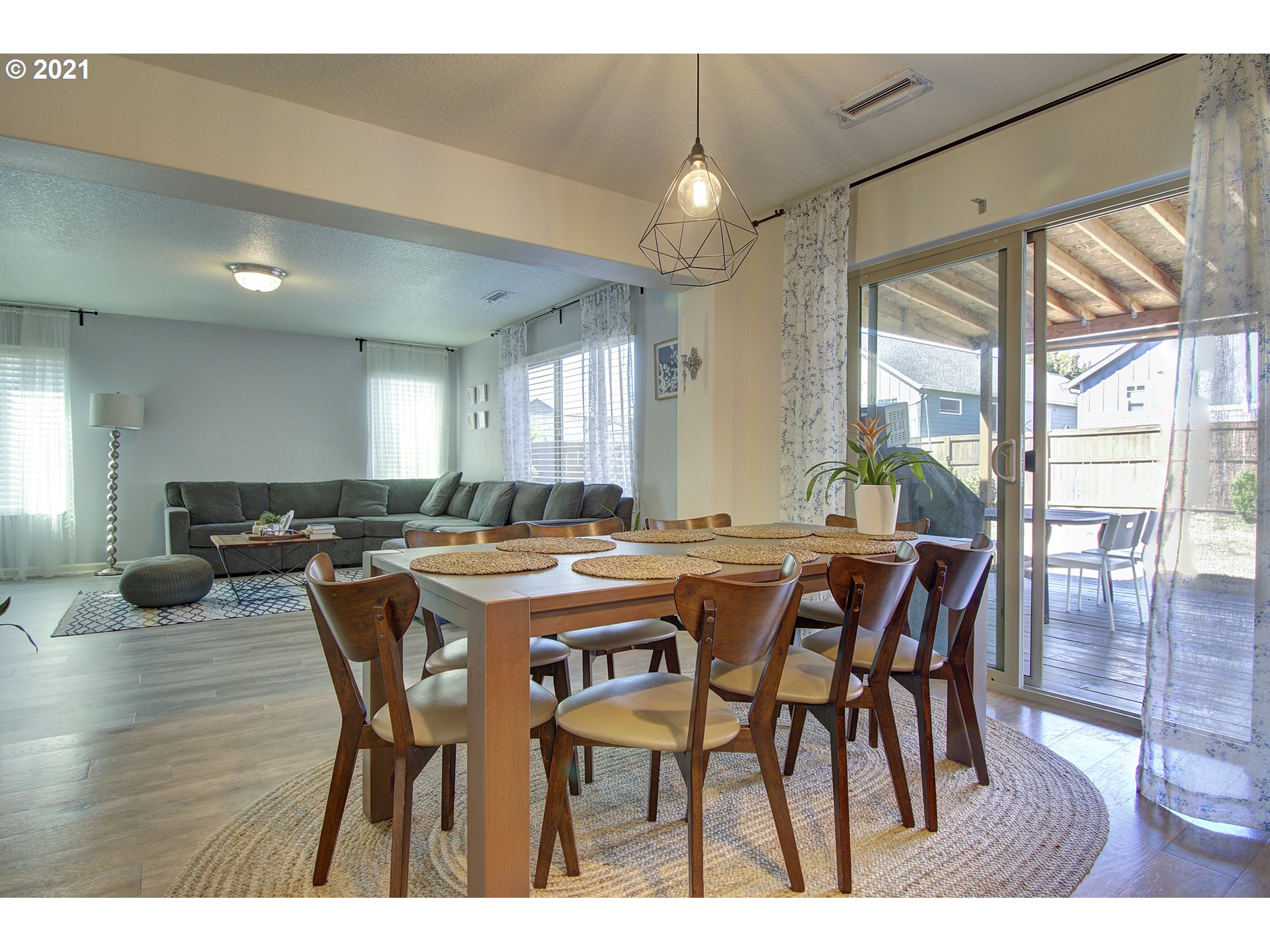 2312 South Sauk Way Ridgefield, WA 98642 - Photo 10 of 29 a view of a dining room with furniture and wooden floor