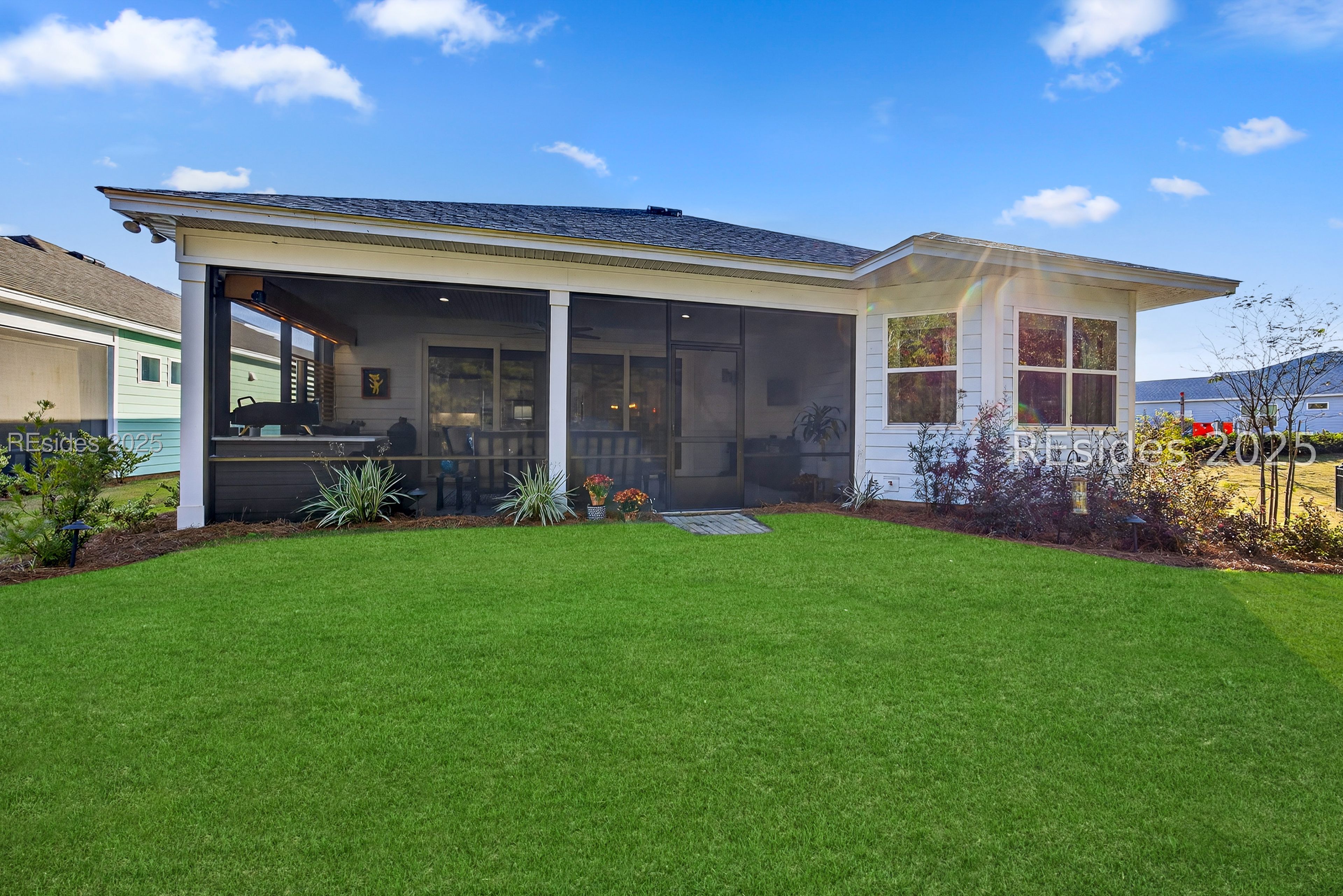 283 Good Life Way Hardeeville, SC 29927 - Photo 45 of 47 View from back yard to Screened Lanai