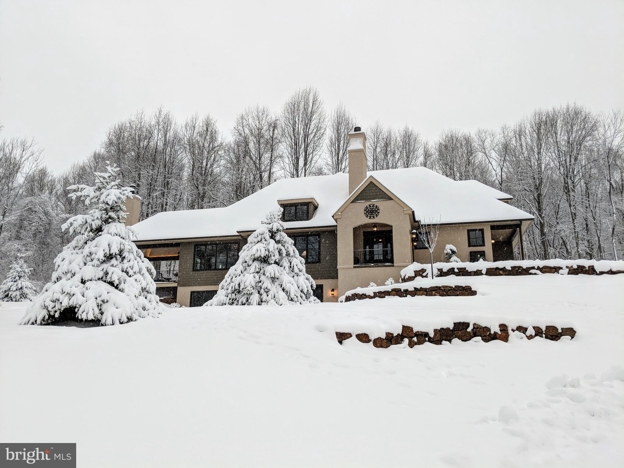 1021 Messner Road Chester Springs, PA 19425 - Photo 21 of 60 Snow covered view of house perched on hillside