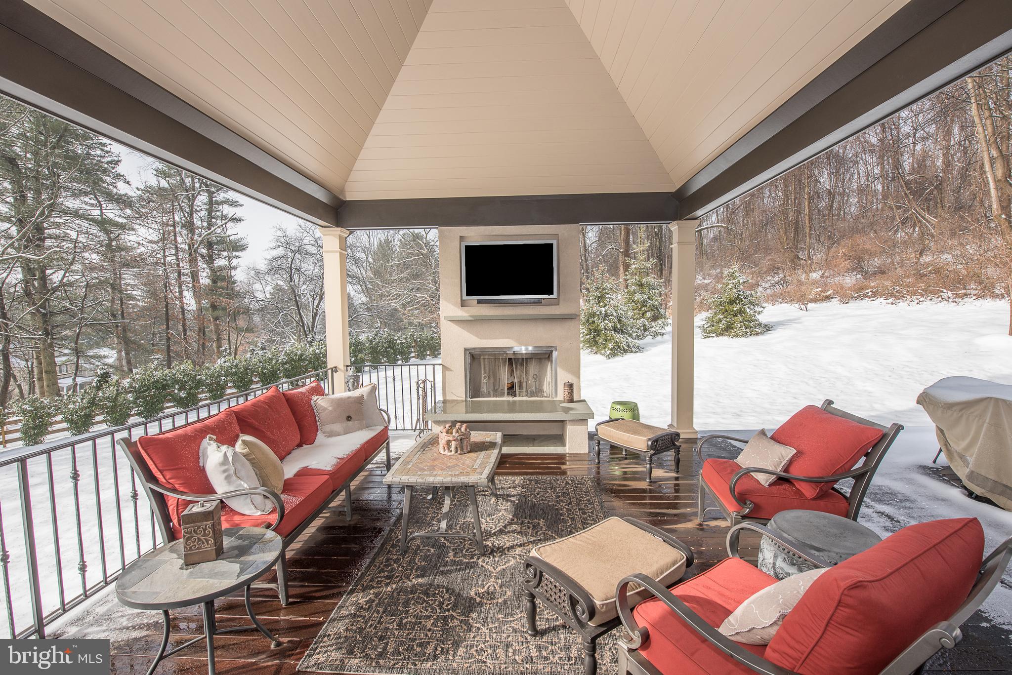 1021 Messner Road Chester Springs, PA 19425 - Photo 22 of 60 Entertainment covered porch w/ FP & Outdoor TV