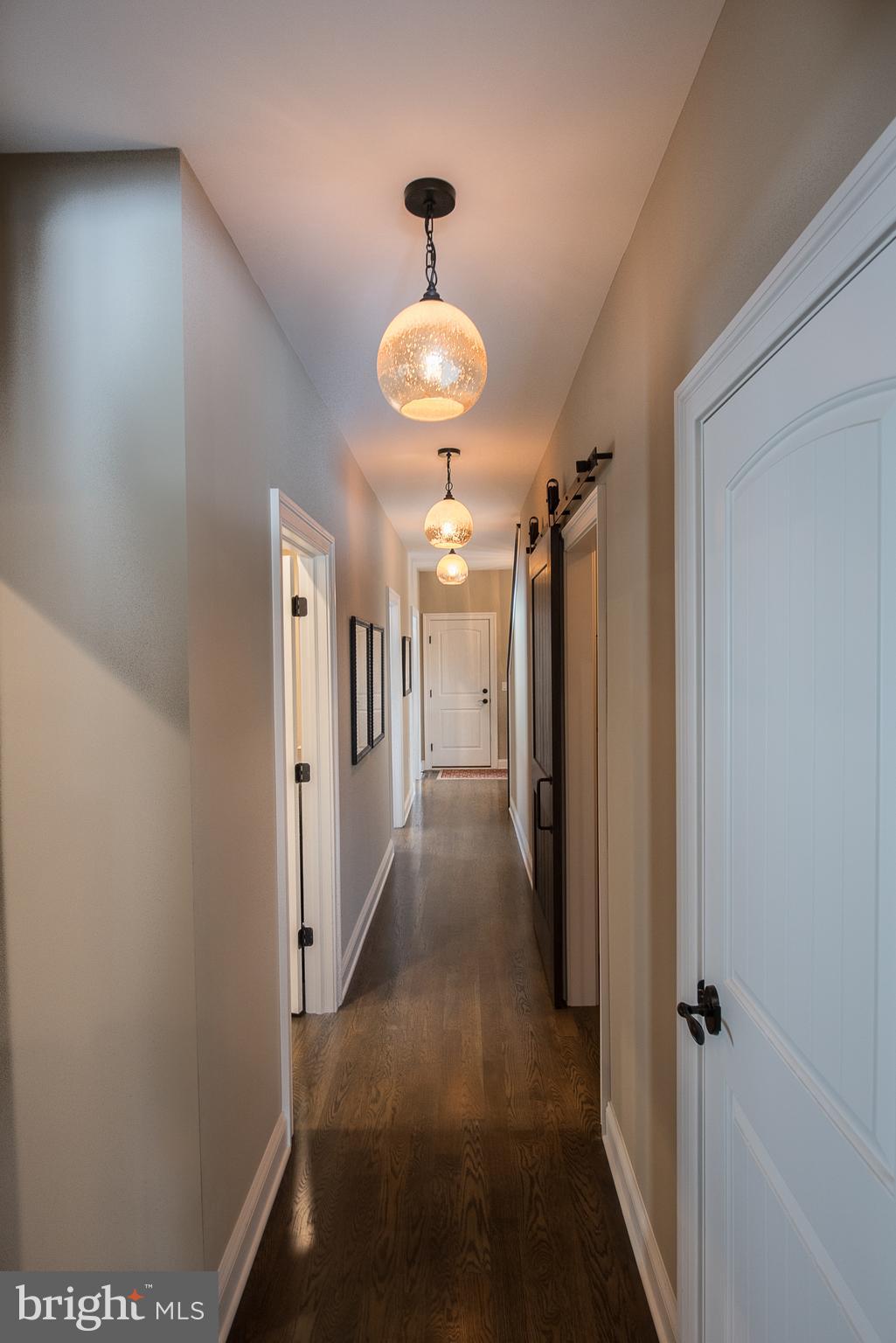 1021 Messner Road Chester Springs, PA 19425 - Photo 46 of 60 Back hallway with custom lighting